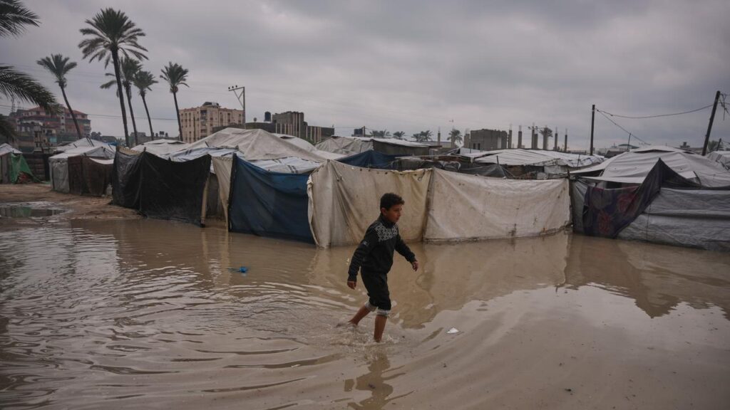 Torrential rain ⁠swept across the Gaza Strip, flooding tents sheltering families displaced by war.
