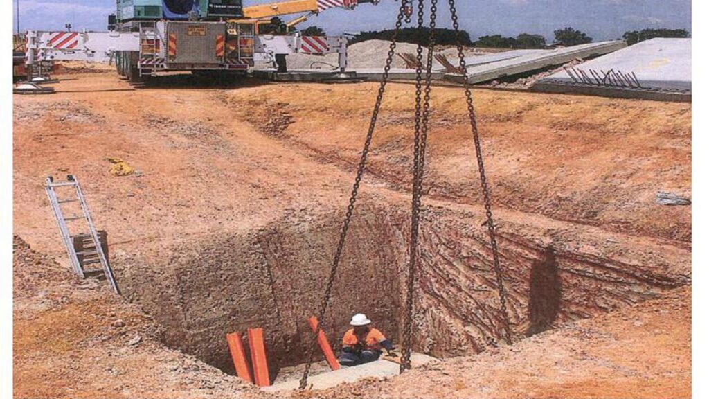Two construction workers were crushed to death between concrete slabs at the Eagle Farm Racecourse.
