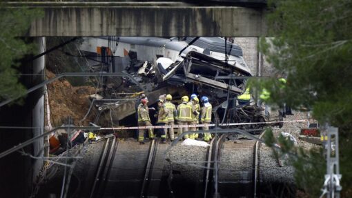Six hurt as Spanish train hits crane in new rail crash Train driver dead, dozens injured in
