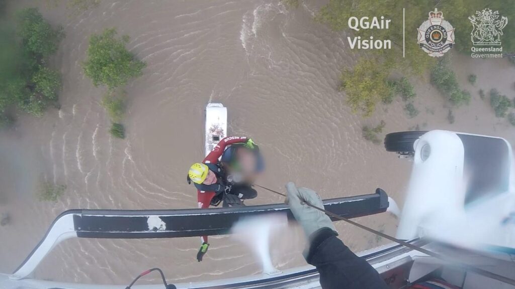 An elderly man was rescued from the roof of his campervan as floodwaters swirled around him.
