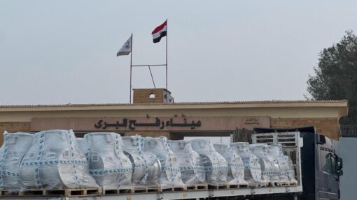 Israeli strikes kill 26, Rafah crossing to reopen Humanitarian aid trucks line up