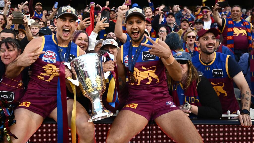 Callum Ah Chee (right) won a second AFL premiership with Brisbane before joining Adelaide.
