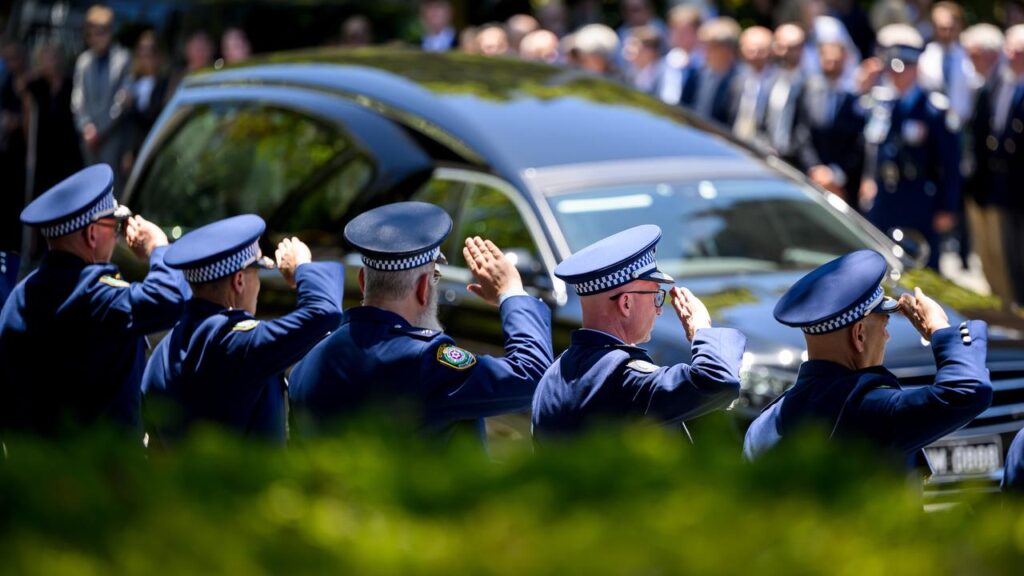 Officers formed a police guard of honour to farewell former Detective Sergeant Peter Meagher.

