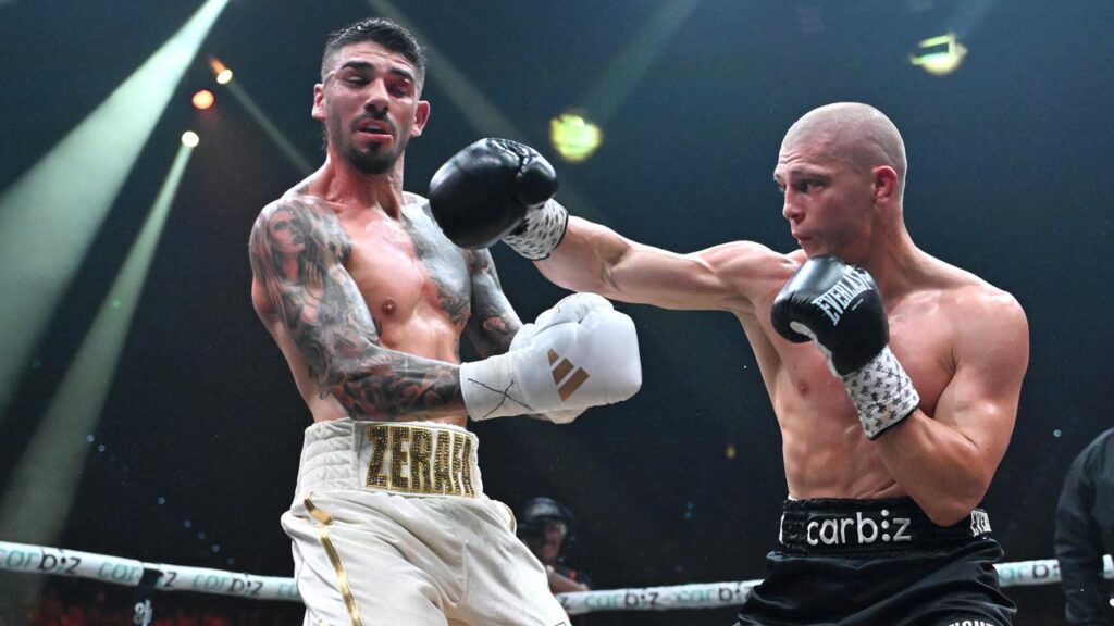 Nikita Tszyu lands a punch on Michael Zerafa during their controversial fight in Brisbane.
