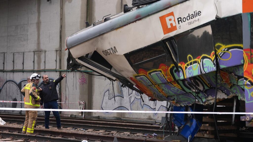 A train driver died after a retaining wall fell onto the track during heavy rain ⁠near Barcelona.
