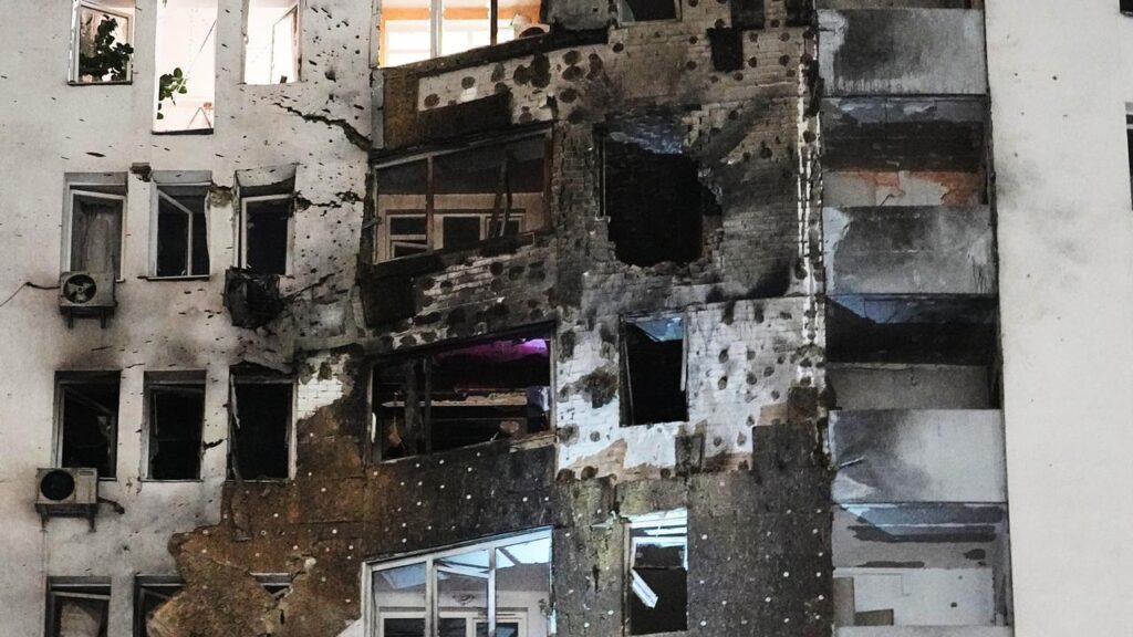Residential buildings have been hit by a Russian missile and drone strike on Kyiv.
