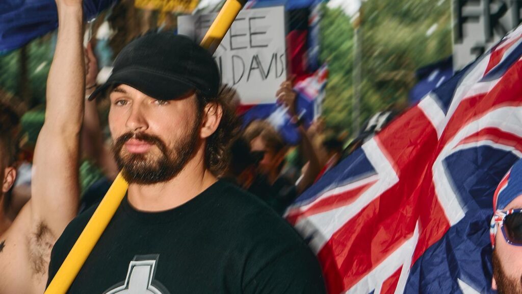 Brandan Koschel is accused of breaching racial hatred incitement laws at an anti-immigration rally.
