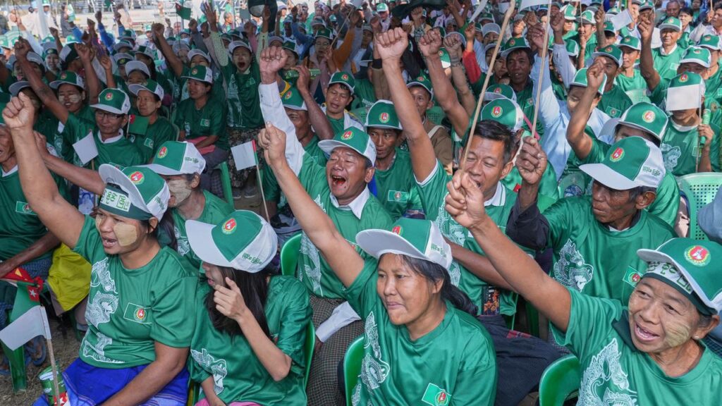 Supporters of Myanmar’s military-backed Union Solidarity and Development Party celebrate victory.
