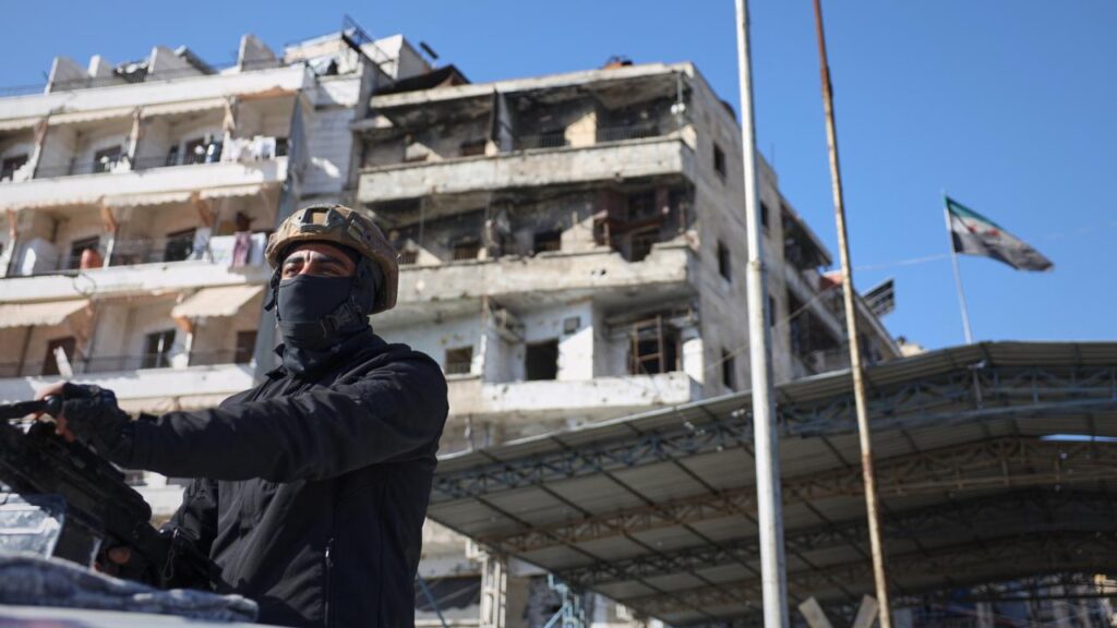 Syrian government-aligned security forces have begun deploying in a neighbourhood of Aleppo.
