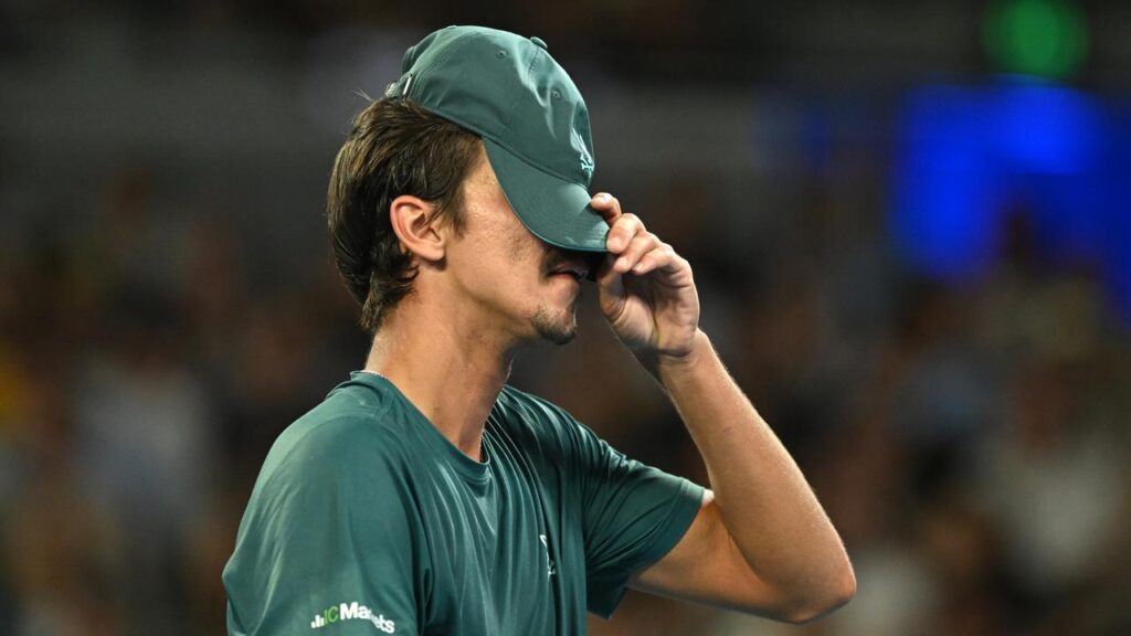 Alexi Popyrin was in despair after blowing three chances to seal his AO first round match.
