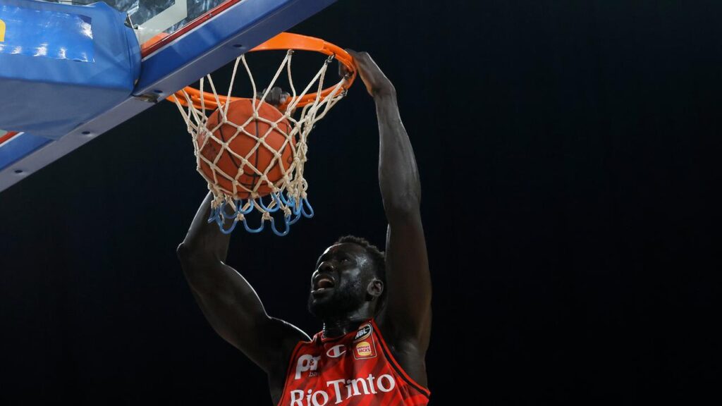 Jo Lual-Acuil Jr, of the Wildcats, dunks during the NBL win over SEM Phoenix at Perth.

