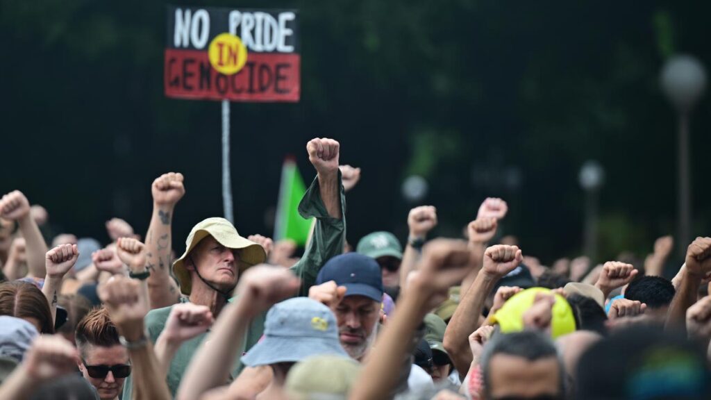 A device allegedly containing ball bearings and screws was thrown into a crowd of protesters.
