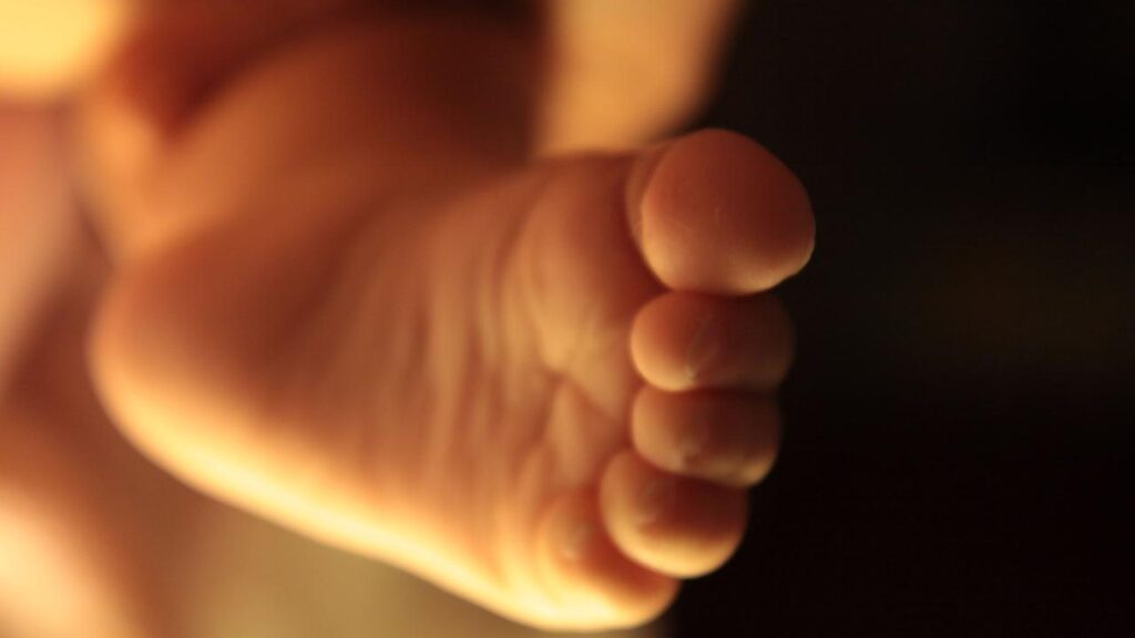 A father is facing court charged with murdering his three-week-old son.
