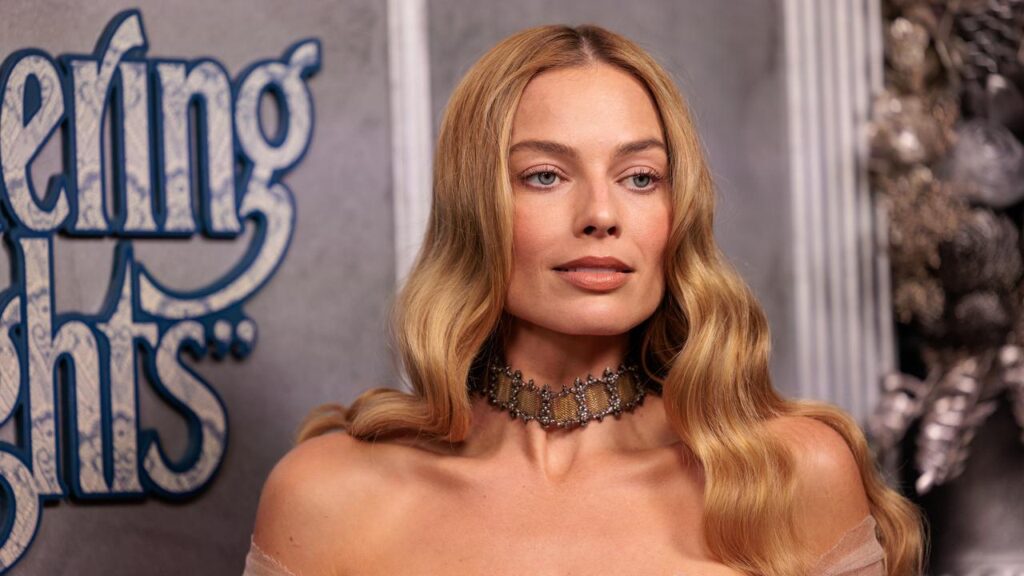 Wuthering Heights star Margot Robbie was picked on as a ‘very small guy’ when playing ice hockey.
