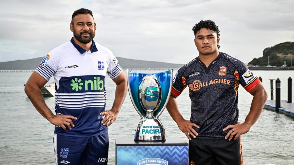 Blues veteran Patrick Tuipulotu and the Chiefs’ Wallace Sititi with the Super Rugby Pacific trophy. 
