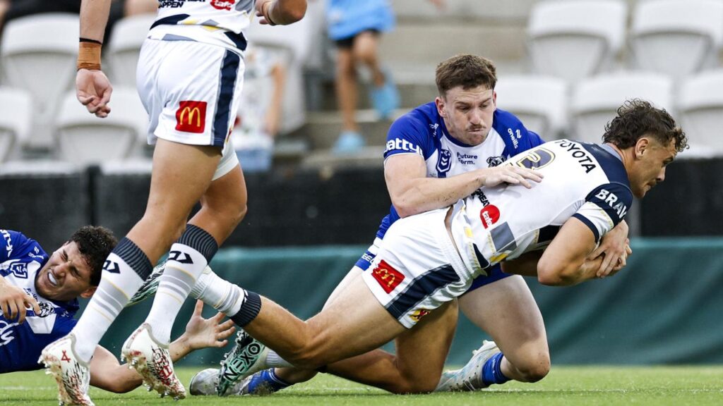 North Queensland’s Zac Laybutt (r) has been charged with a grade-two dangerous throw.
