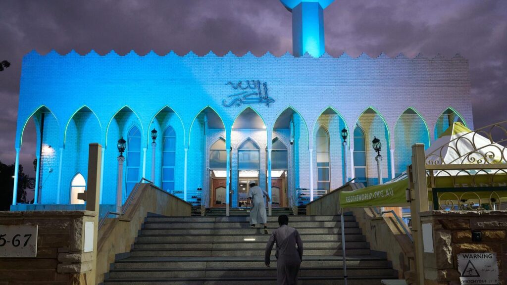 Worshippers wait for sunset before breaking their fast during Ramadan at Lakemba Mosque in Sydney.
