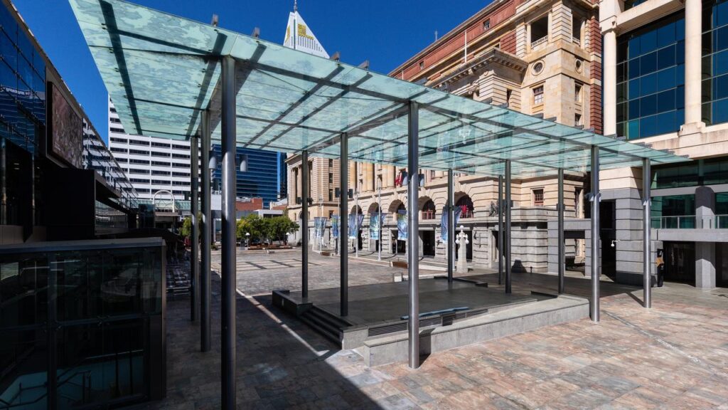 It is alleged an explosive device was thrown into a crowd of thousands of people at a Perth rally.
