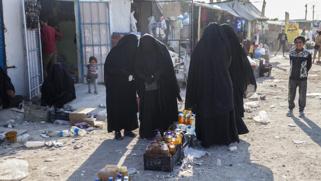 Dozens of women and children had tried to leave a Syrian refugee camp on Monday to go to Australia.
