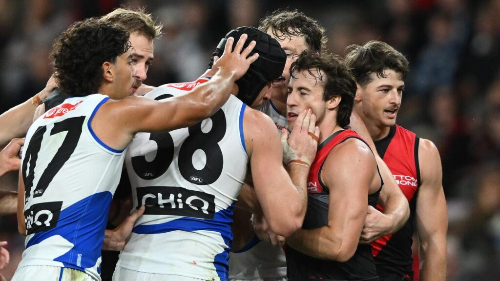Kangaroos ruckman Tristan Xerri is heading to the AFL tribunal for wiping blood on Andrew McGrath.
