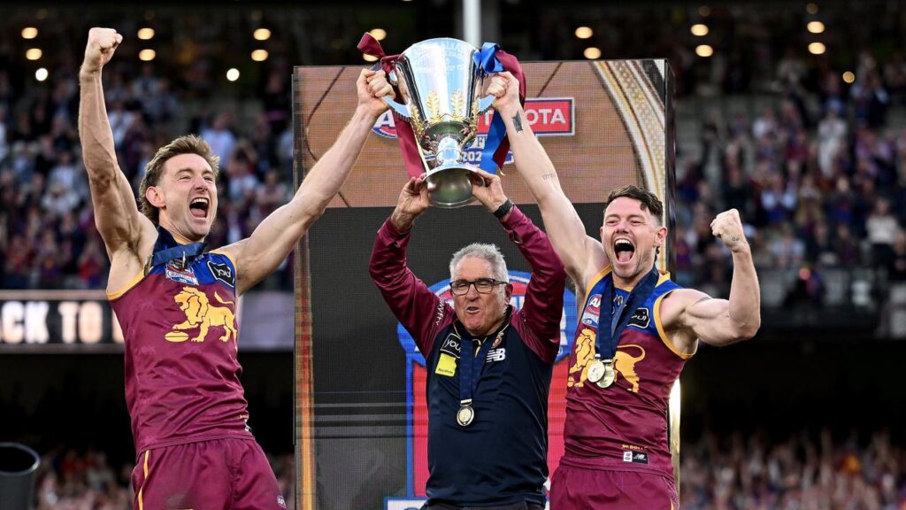 Harris Andrews (l) believes Brisbane are well poised to chase a three-peat this year.
