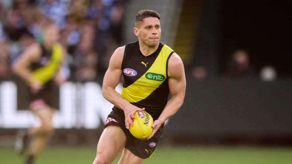 Three-time premiership player Don Prestia and another AFL star deny any involvement in a brawl.

