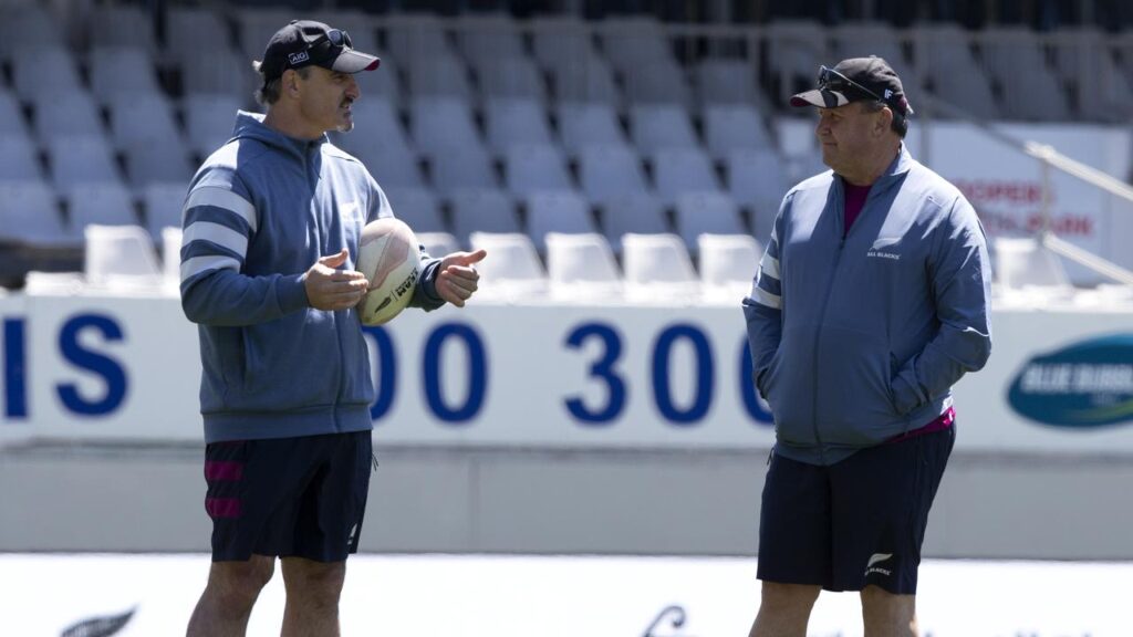 New Wallabies defence coach Scott McLeod (L) while working with the All Blacks under Ian Foster (R).
