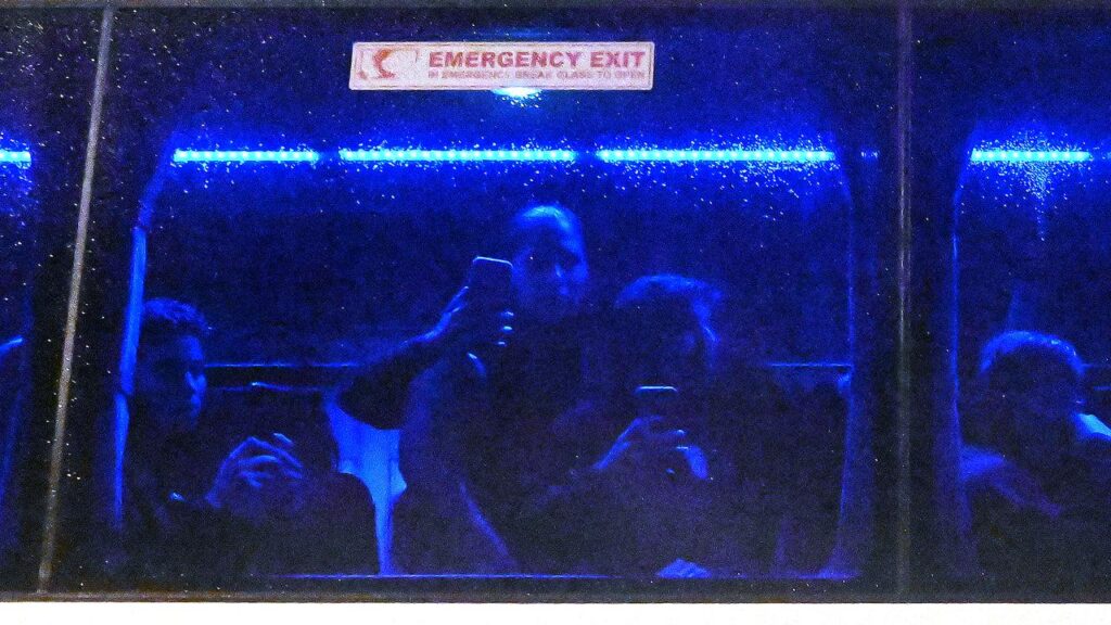 Iranian soccer players appeared to film the crowd through the window after their final game.
