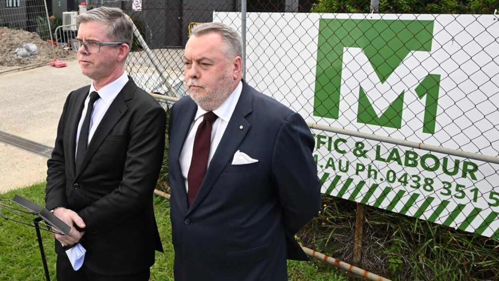 Inquiry officials Patrick Wheelahan and Stuart Wood questioned M1 Traffic Control’s new operation.
