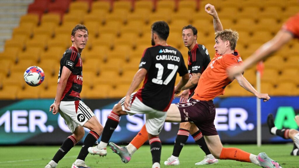 Niall Thom has scored his first ALM goal to earn hosts Brisbane a point against the Wanderers.
