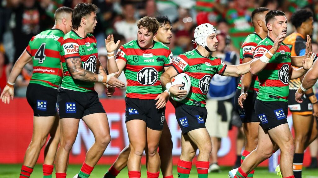 South Sydney celebrate Jye Gray’s try on their way to a thrilling win over Wests Tigers.  
