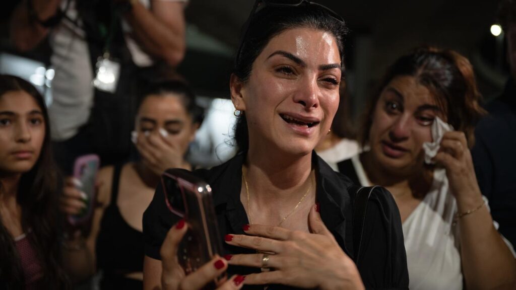 Iranian protesters appeared at Sydney Airport as members of the Iranian football team departed.
