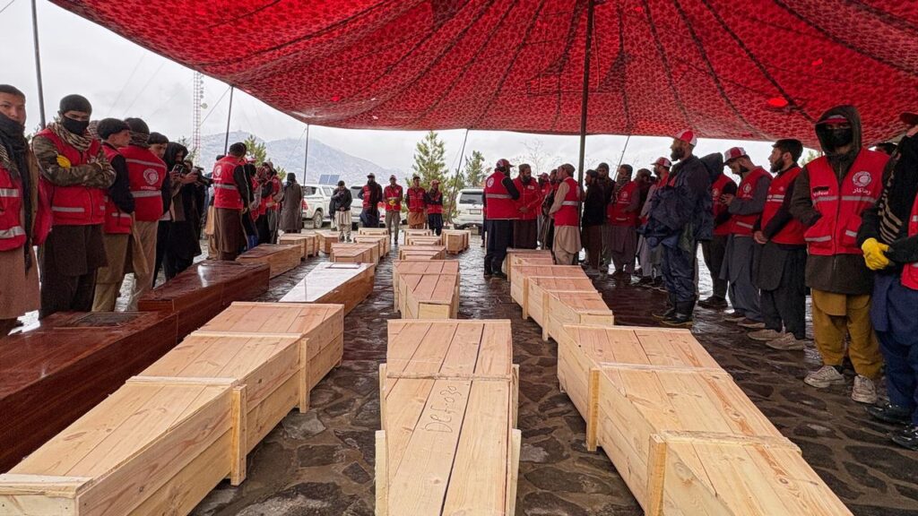 A mass funeral is being held for hundreds allegedly killed in a strike on a Kabul hospital.
