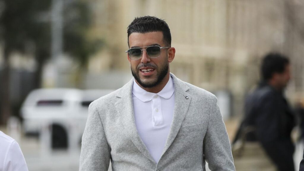 Adrian Portelli has been cleared of running illegal lotteries but his business has been fined.
