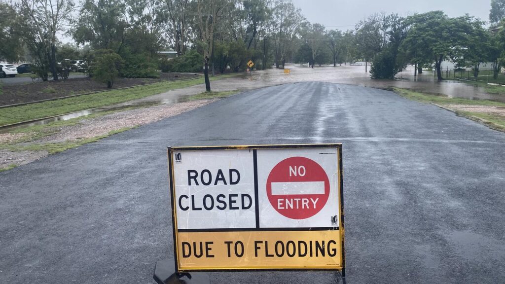 Hundreds of Queensland roads have been cut by floodwaters after a tropical low ravaged the state.
