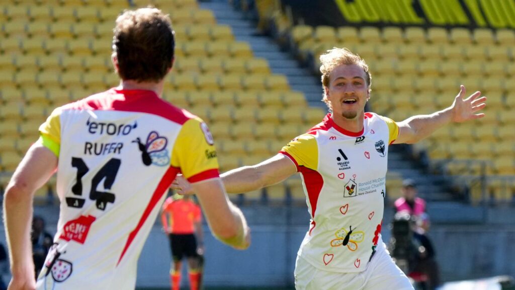 Corban Piper celebrates his opening goal in Wellington’ Phoenix’s 2-0 win over Perth Glory. 
