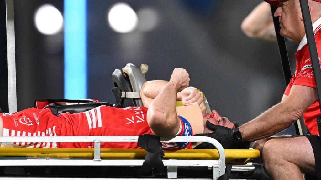 Kyle Flanagan leaves the Cbus Super Stadium field on a stretcher.
