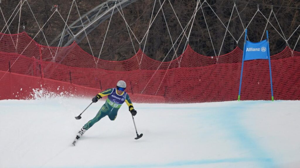 Australian alpine skier Michael Milton competes in the combined super-G standing event in Cortina.
