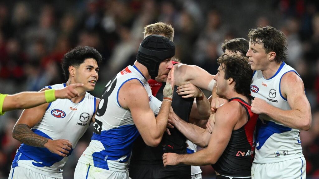 North Melbourne’s Tristan Xerri (c) will front the AFL tribunal on Monday evening.
