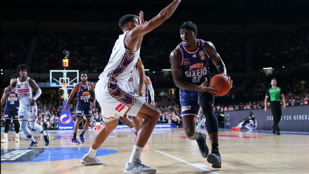 Zylan Cheatham (r) has led Adelaide to a thrilling win over Sydney in the NBL grand final series.
