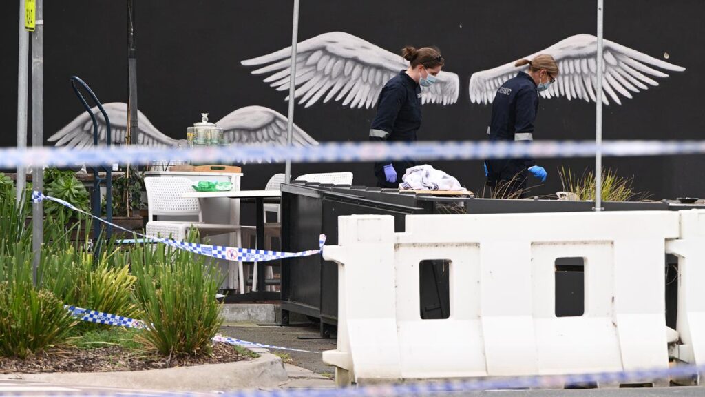 One of two men on trial for an underworld hit was not one of the masked shooters, a jury has heard.
