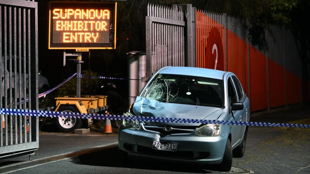 A car has struck two people near a popular fan convention, killing one and injuring the other.
