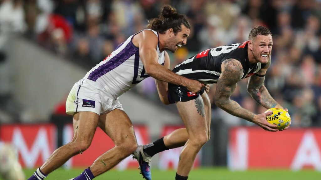 Fremantle skipper Alex Pearce personified the Dockers’ determination against Magpie Tim Membrey.
