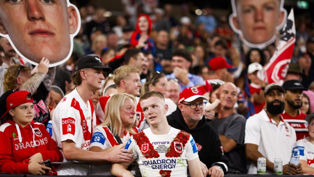 Kade Reed was consoled by proud family and friends after he debuted in the Dragons’ huge loss. 
