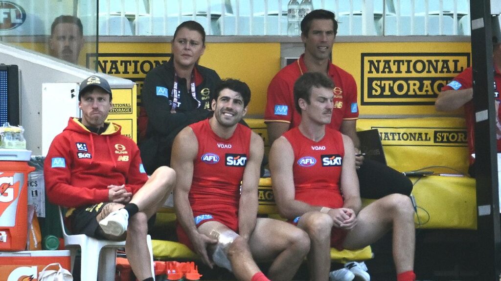 Christian Petracca (centre) is expected to be passed fit for the clash against Essendon.
