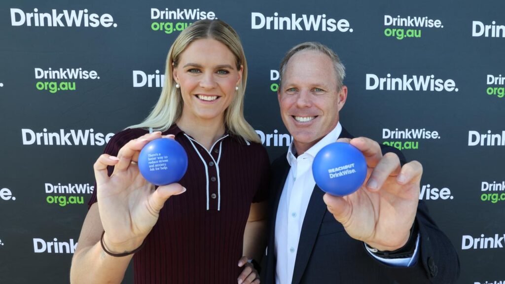 Shayna Jack, with DrinkWise chief executive Simon Strahan, is promoting safer drinking decisions.
