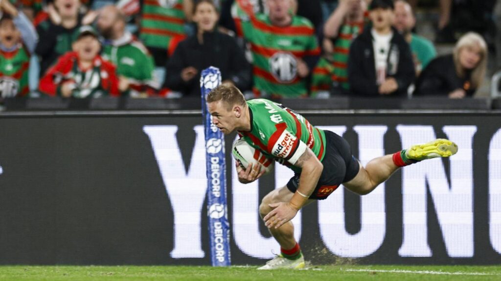 Rabbitohs’ Matthew Dufty scores a try just hours after a hospital emergency with his baby.
