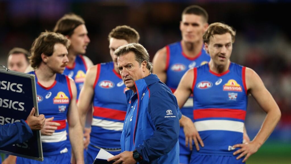 Bulldogs coach Luke Beveridge is keeping his players grounded as they prepare for Essendon.
