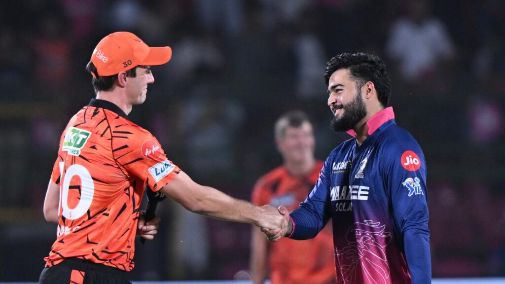 Sunrisers’ Pat Cummins is welcomed back to the IPL by Rajasthan Royals captain Riyan Parag.
