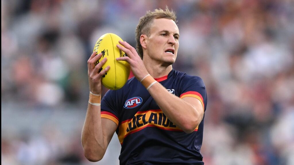 Jordan Dawson warming up: Adelaide’s captain was inspirational in tough circumstances in Brisbane.
